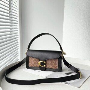It comes with two shoulder straps, one long for crossbody and one short for hand